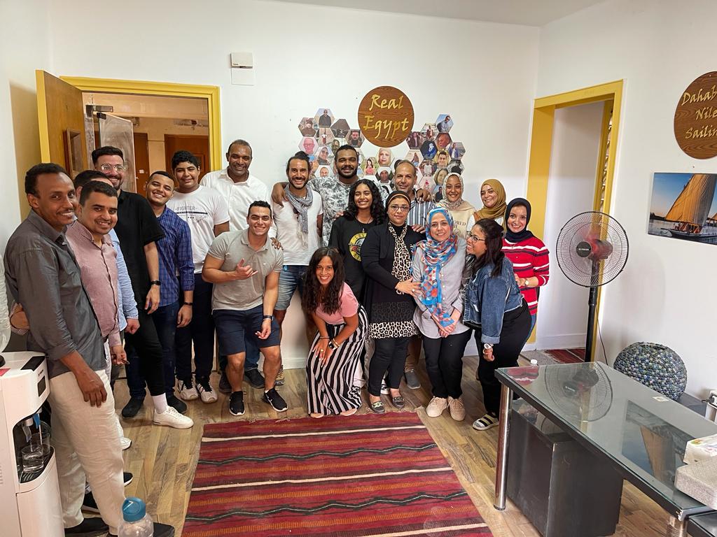 A photo of the Real Egypt Team in the office
