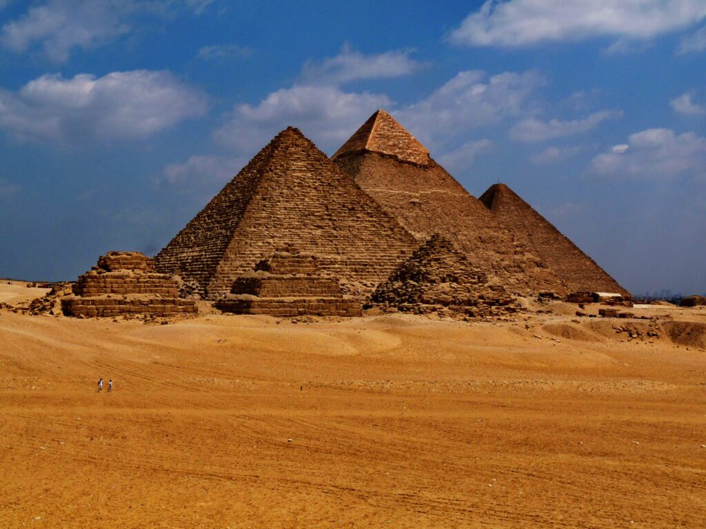 a photo showing the Giza pyramids and Sphinx in Egypt